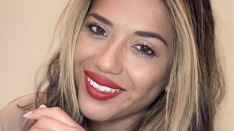 Nancy Rodriguez red lipstick selfie