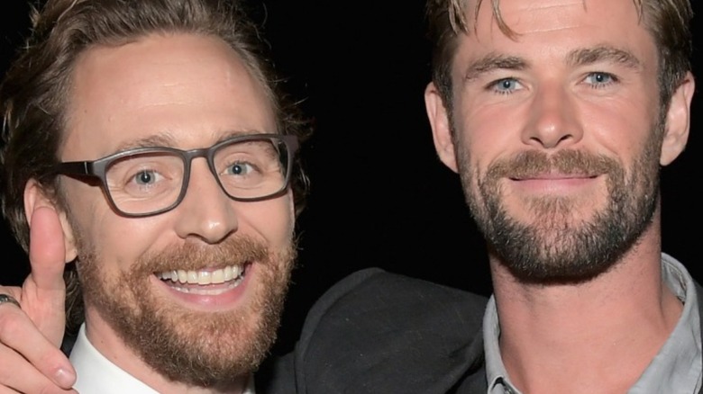 Chris Hemsworth and Tom Hiddleston in glasses