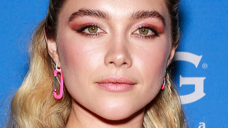 Florence Pugh wears pink dangle earrings 