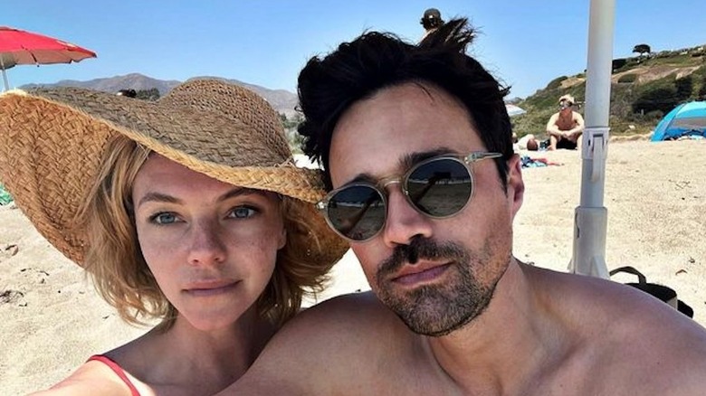 Eloise Mumford and Brett Dalton on the beach