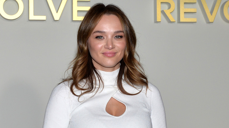 Hunter King wearing white