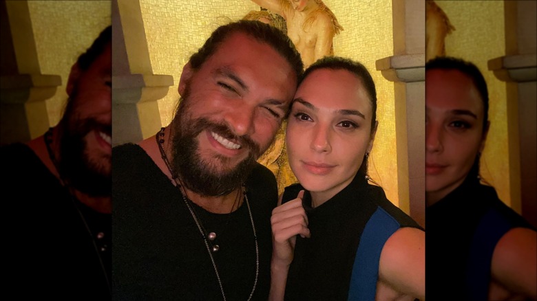 Jason Momoa and Gal Gadot posing