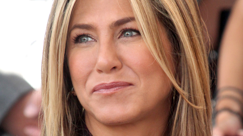 Jennifer Aniston with downturned lips