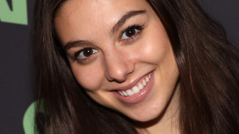 Kira Kosarin head cocked smiling