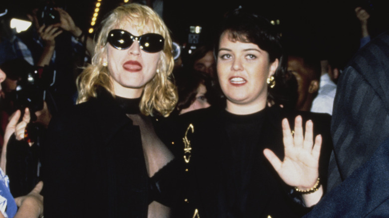 Rosie O'Donnell walking through crowd with Madonna