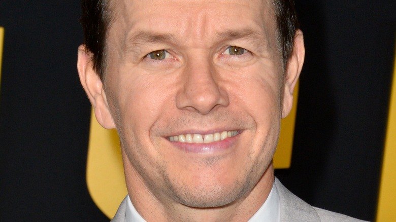 Mark Wahlberg smiling at movie premiere