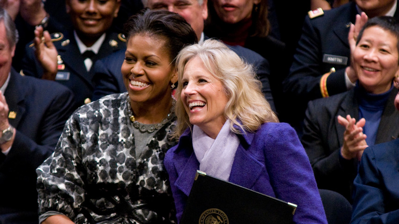 Michelle Obama and Jill Biden laugh together