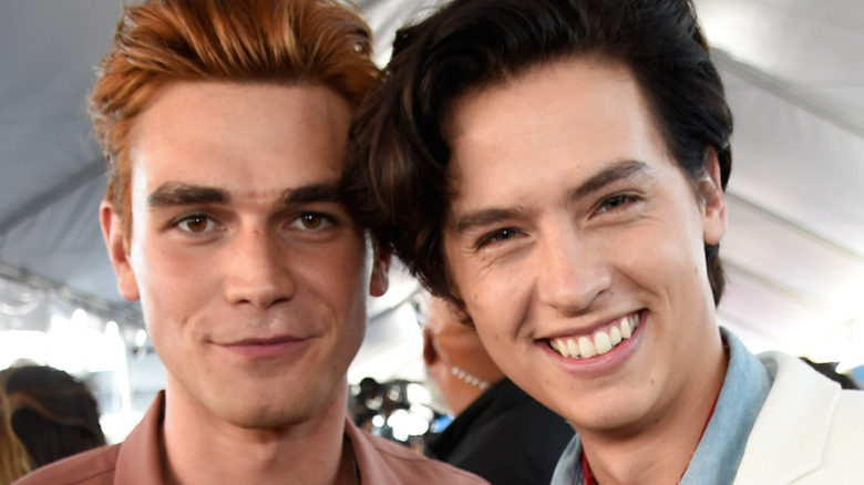 KJ Apa and Cole Sprouse smiling