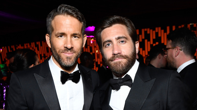 Ryan Reynolds and Jake Gyllenhaal in tuxedos and bowties