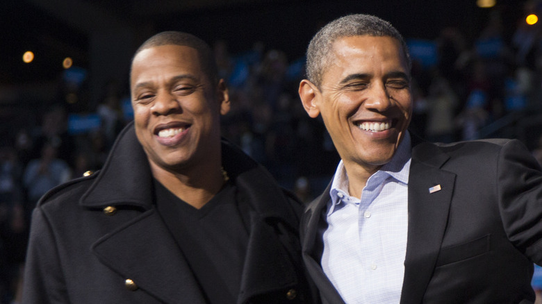 Barack Obama and Jay-Z smiling