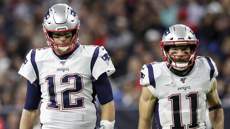 Julian Edelman playing football with Tom Brady