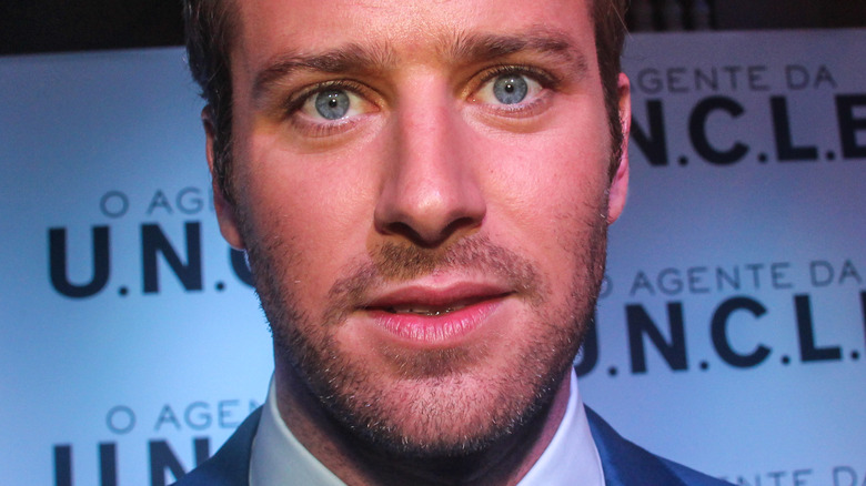 Armie Hammer staring