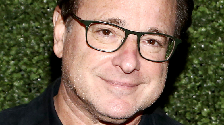 Bob Saget posing for cameras 