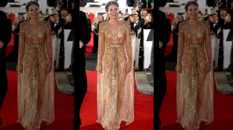 Kate Middleton wearing gold dress on the red carpet at the "No Time To Die" premiere