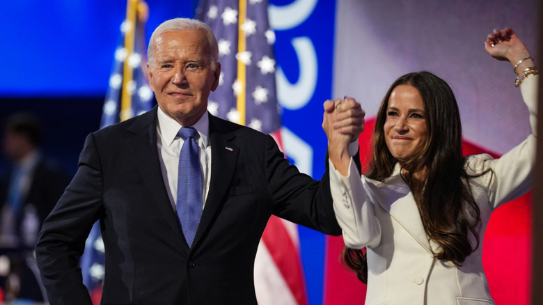 Joe Biden holding hands with Ashley Biden