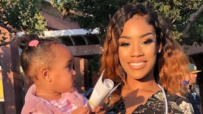 Ashley Jones holds her daughter Holly