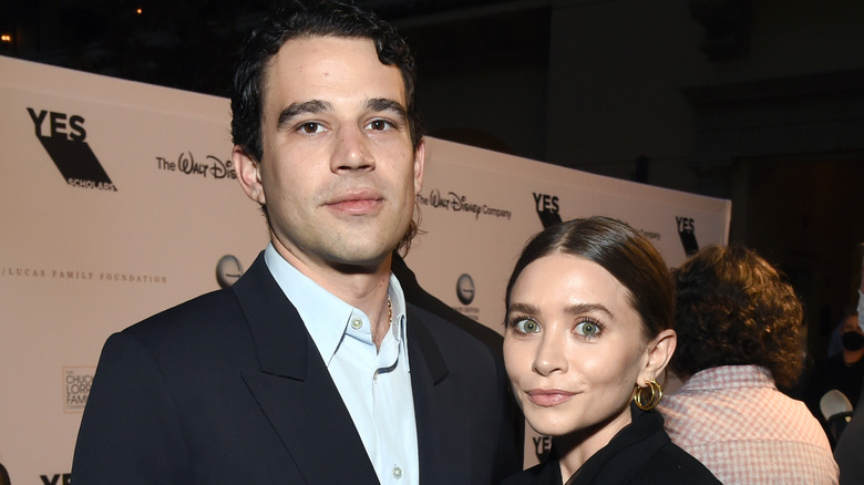 Ashley Olsen posing with Louis Eisner 