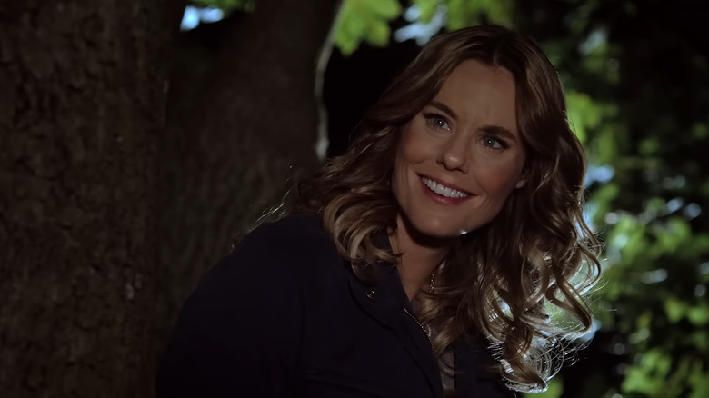 Ashley Williams sitting in a tree in "Love on a Limb"