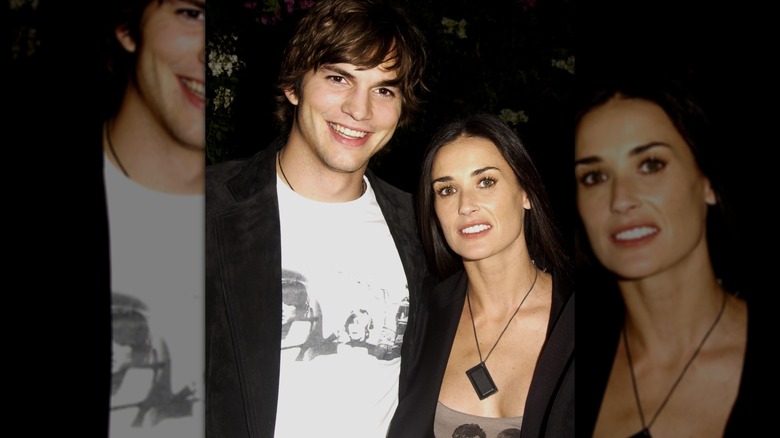 Ashton Kutcher and Demi Moore smiling in an up-close photo.
