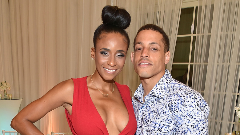 Miko Grimes and Brent Grimes posing 