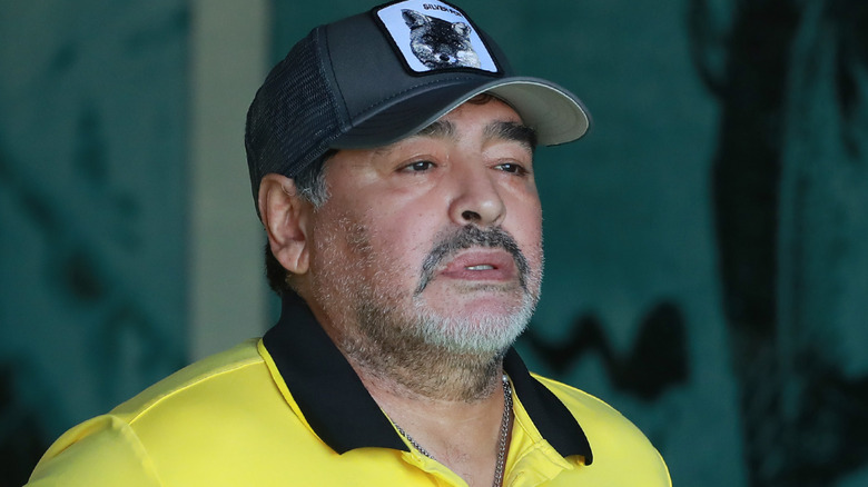 Diego Maradona looks on