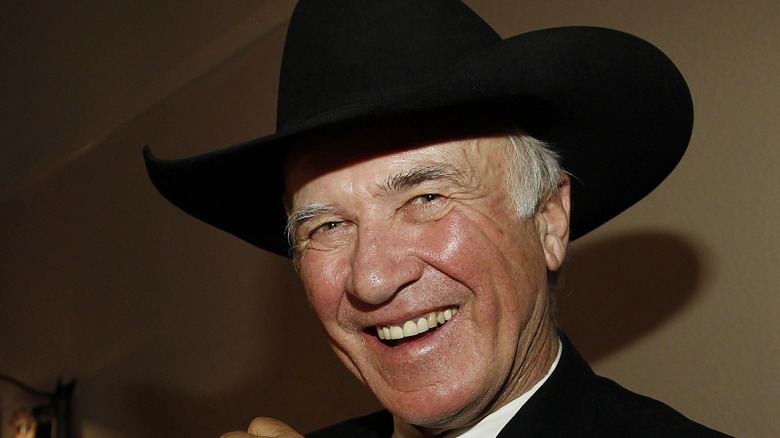 Larry Mahan smiling in stetson and bolo tie in 2011