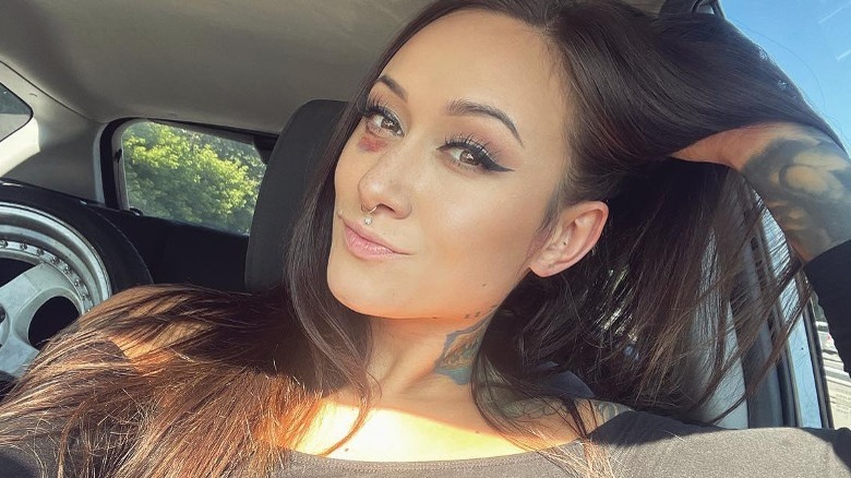 Sherry Schmidt smiling selfie in car