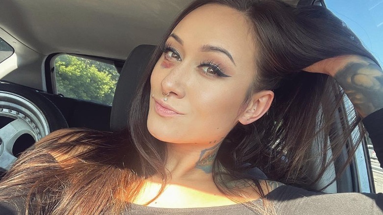 Sherry Schmidt smiling selfie in car