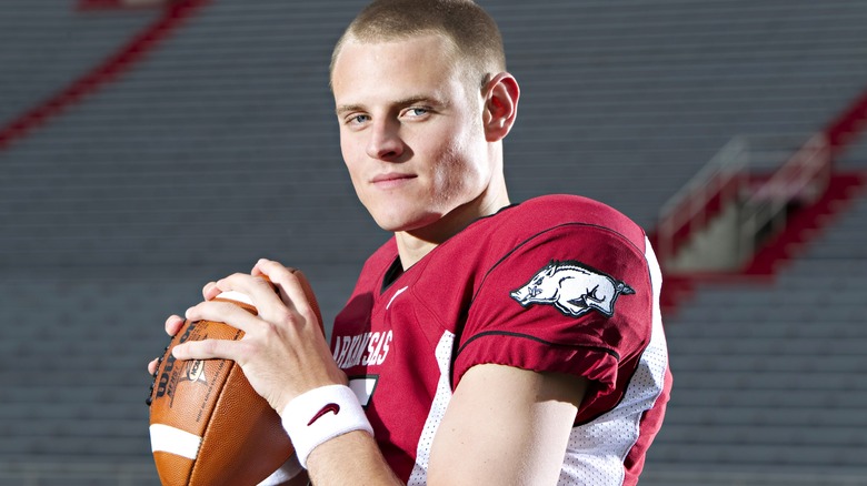 Ryan Mallett holds oval ball