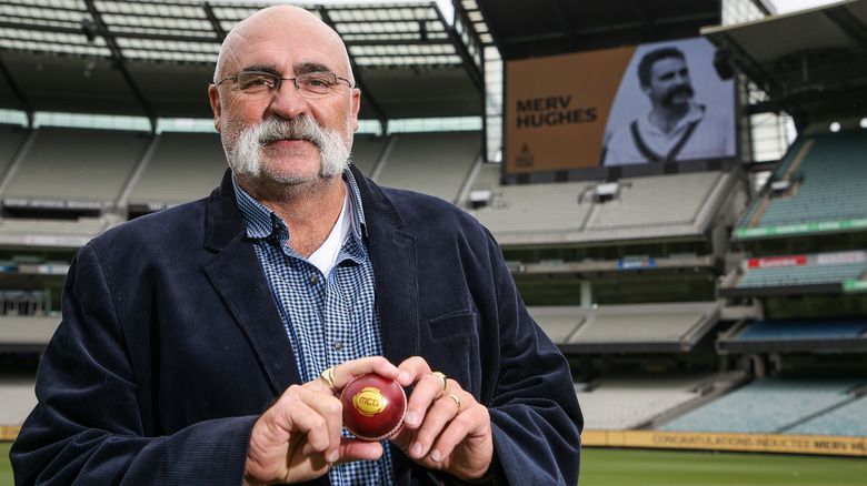 Merv Hughes posing