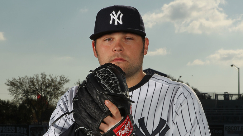 Joba Chamberlain posing as a New York Yankee