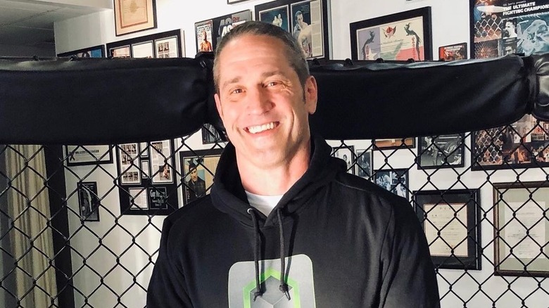 Guy Mezger smiling in studio