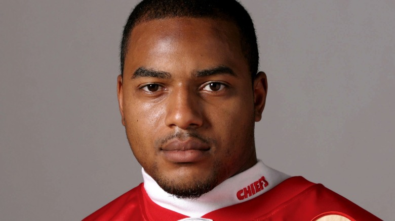 Larry Johnson wearing Chiefs shirt