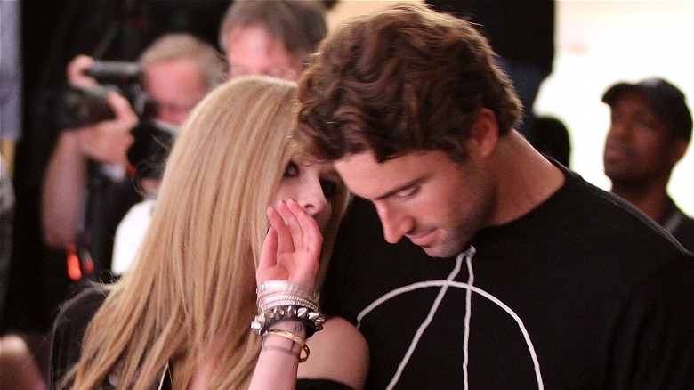 Avril Lavigne talking to Brody Jenner