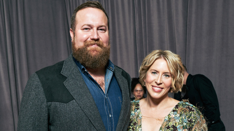 Ben and Erin Napier smiling and their arms around each other