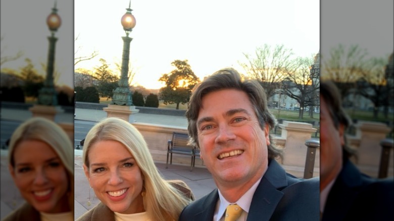 Pam Bondi and John Wakefield posing together outside the Library of Congress