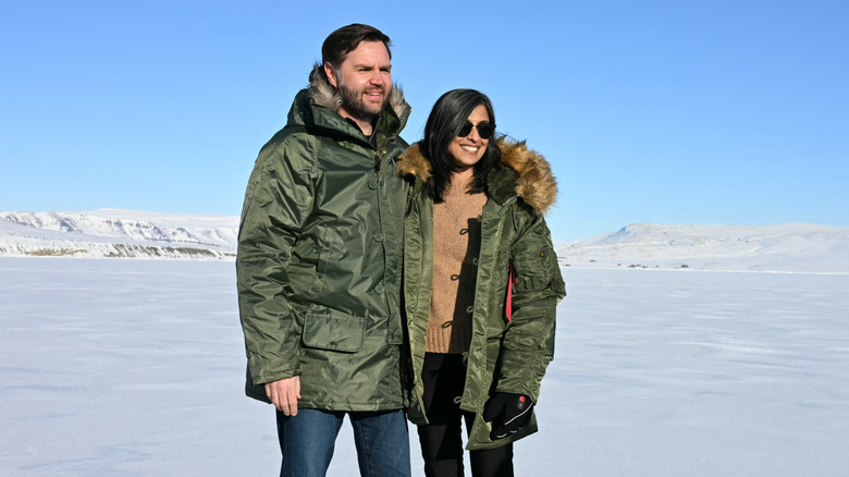 JD and Usha Vance pose on the snow in Greenland.
