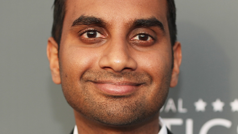 Aziz Ansari smiling