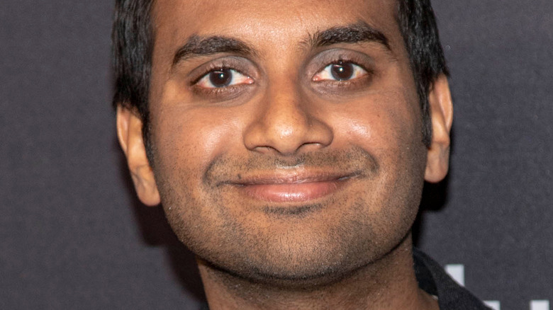 Aziz Ansari posing