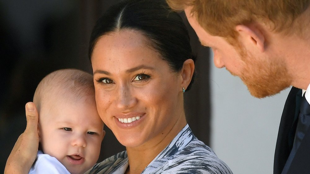 Meghan with baby Archie and Prince Harry 