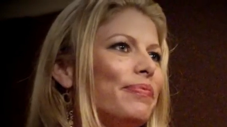 Erin Storm looking to the side with slight smile