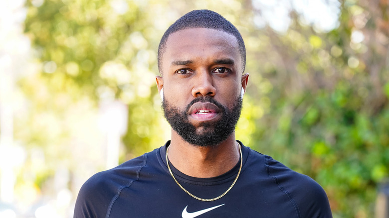 DeMario Jackson standing in front of trees