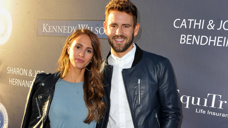 Vanessa Grimaldi and Nick Viall smiling on red carpet