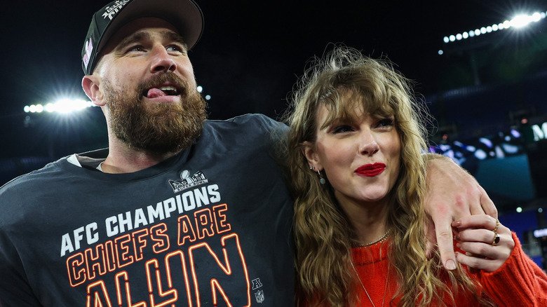 Taylor Swift and Travis Kelce hugging