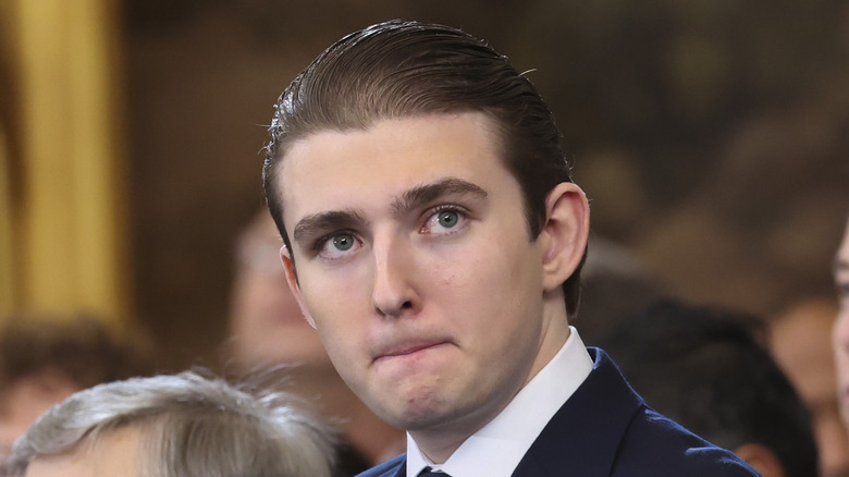 Barron Trump looks off-camera during Donald Trump's inauguration in January 2025