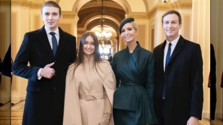Barron Trump posing with Ivanka Trump and family