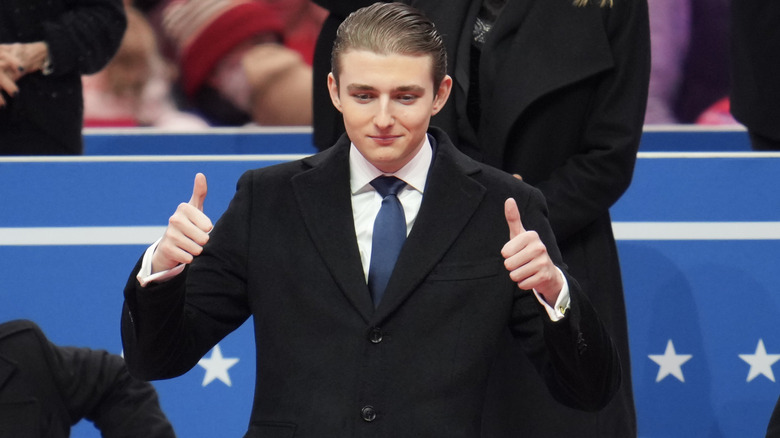 Barron Trump giving two thumbs up