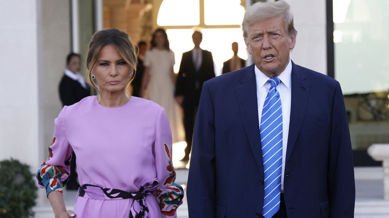 Melania Trump and Donald Trump outdoors