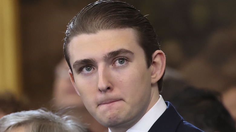 Barron Trump staring off into the distance