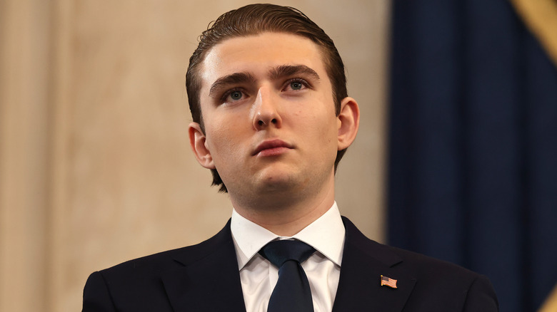 Barron Trump standing on a stage